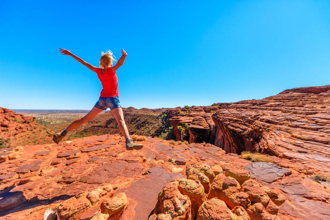 Young_hiking_girl_jumping_at_Kings_%20Canyon.jpg